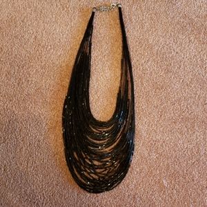 Long black beaded necklace